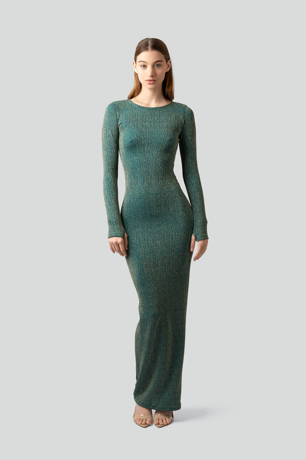 Woman wearing a deep teal bodycon maxi dress featuring a textured shimmer stretch fabric and a classic round neckline