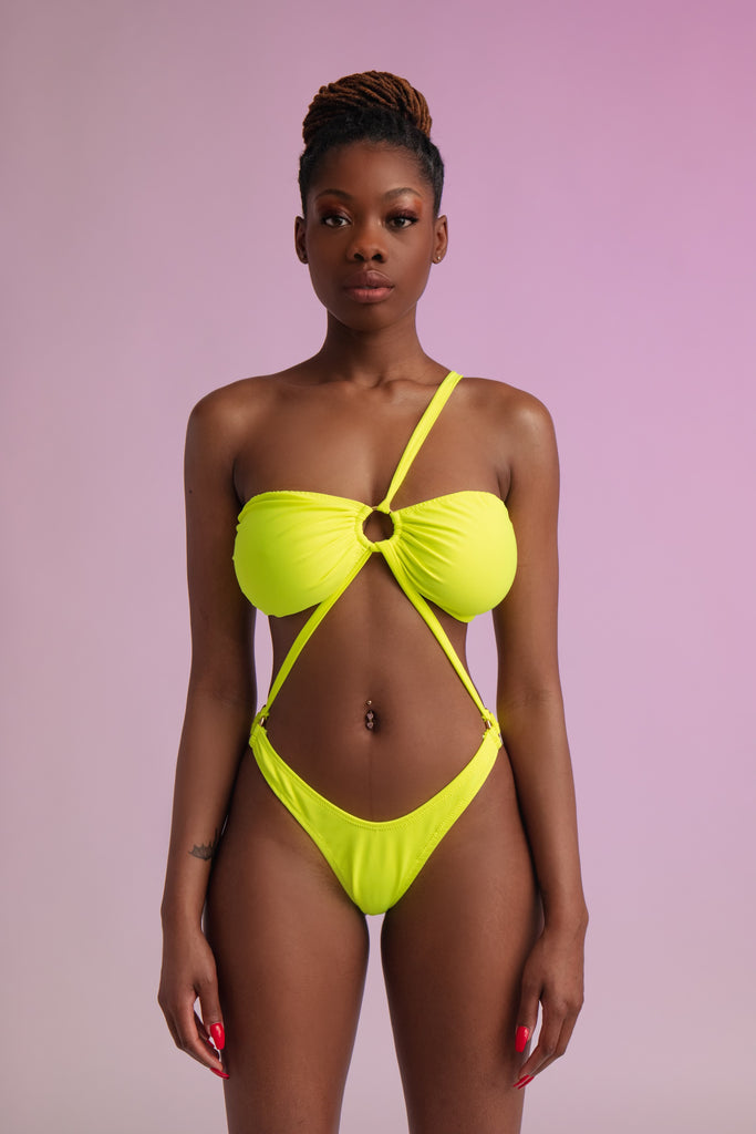 Neon yellow one piece swimsuit,  tubetop connected to a V shape bottom by straps